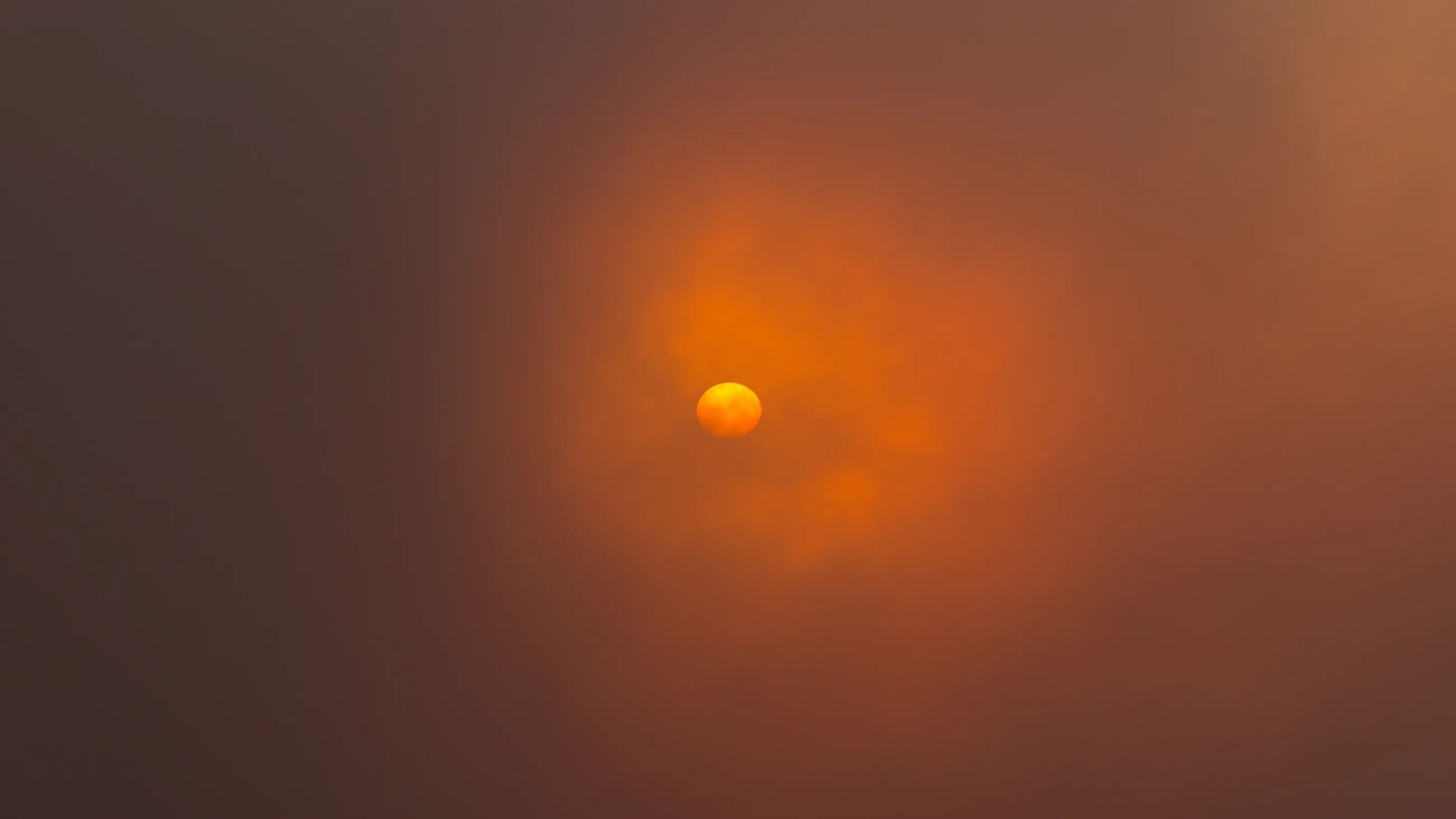 Deep Desert sun blazes over Atlantic islands.