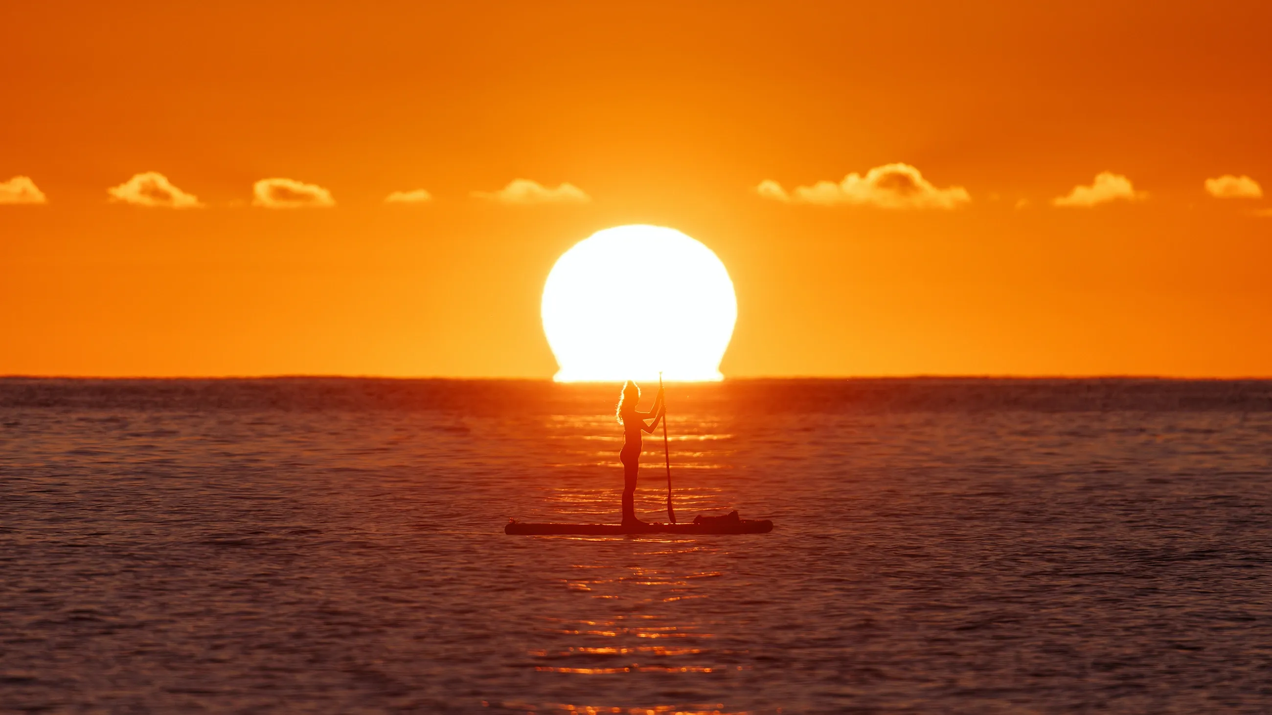 Celebrating sunrise, islander style.