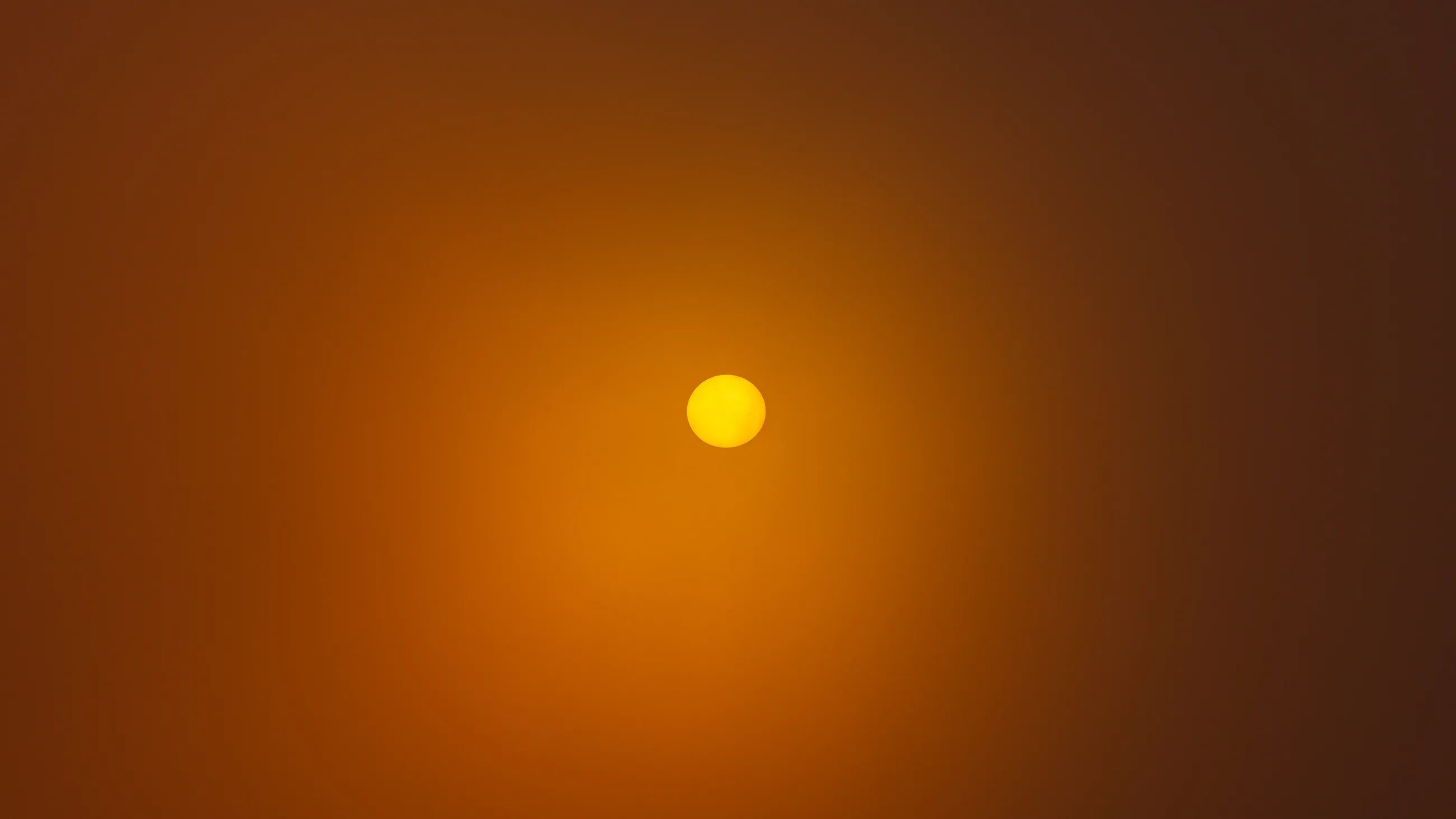 Deep Desert sun blazes over Atlantic islands.